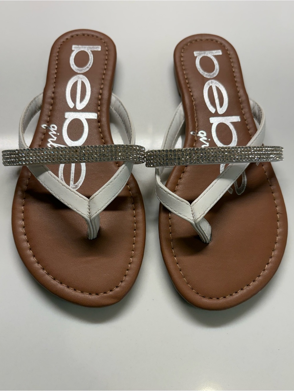 Bebe White Rhinestone Thong Sandals. READ ADDITIONAL DETAILS- Runs Small